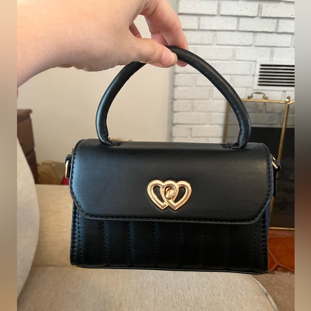 Black leather mini purse with gold heart accent